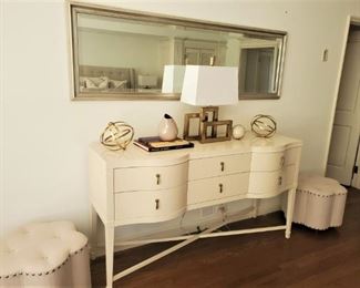 Console with silver felt lined drawers $799 ~ Lamp $119 ~ Ottomans $99 each ~ Silver Mirror $189 ~  