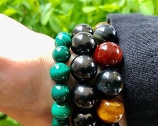 Green Malachite $20, sudalite $30  (Supposedly protects wearer from EMFs) and 3 colors of the beautiful stone tigers eye for just 36.  This make up this stunner combination.  Each bracelet is sold separately.  And comes on a nylon reinforced elastic.