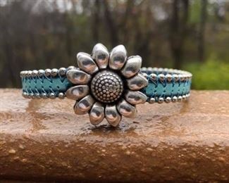 Do you know someone who Loves Sunflowers?! For only 32 this Turquoise and silver beaded Sunflower Charm on a leather bracelet with a strong magnetic clasp can be yours.  Can be made to 6-8 inch wrist.  