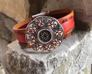 LEATHER BRACELET WITH MAGNETIC CLASP AND COOL DECAL FOR $55.  CAN BE MADE TO FIT MOST WRIST. PLEASE CALL 915.519.7653 WITH ANY QUESTIONS.  OTHER LEATHER COMBO AND COLOR CHOICES AVAILABLE. 
