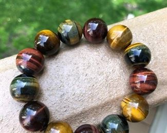 $39 for beautiful 3 colors of Tigers eye stone.  Bracelet has strong nylon cord.