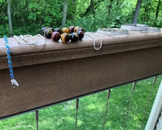CREATED OPAL BRACELET, STRETCHY ROSE GOLD AND TIGERS EYE ALONG WITH A FEW BLINGY BANGLES.