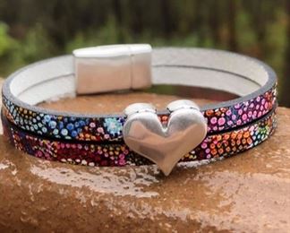 $32 FOR THIS STUNNING LEATHER BRACELET WITH HEART CHARM AND MAGNETIC CLASP.  WE HAVE OTHER LEATHER AND CHARMS.  JUST ASK IF YOU HAVE A COLOR PERFERANCE AND WE CAN SEE IF WE HAVE THAT AVAILABLE.  