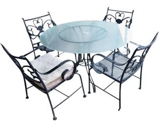 43. Glass Top Patio Table and Chairs