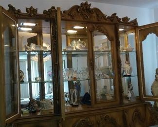 Lighted Elegant Carved Wood and Glass fronted Doors China Cabinet.
Was 3,200 new, our price $1,200. obo.
