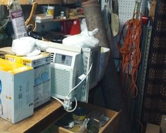 Parts tools screws nails nuts bolts endless supply.  Plus a Window Air Conditioner for you Jaguar Car Window... Lol.