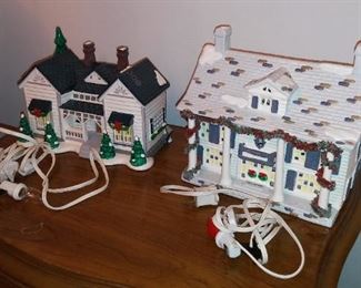 Lighted Christmas Houses of fine ceramic, with their Original Boxes.  Like new condition.