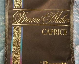 Bassett Furniture Company, "Dream Maker - Caprice", Twin Bed Mattress "FIRM" and BoxSpring, in "Guest Bedroom", in like New Condition. Includes Steel Frame with Wheels below. Asking $80. 