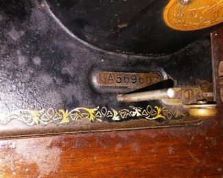Vintage American Singer Sewing Machine with Serial Number Code Number. Age unknown. Asking $200. obo.