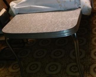 Long Vintage American Mica and Aluminum Kitchen Table with one 1 extra leaf.  Gray tone mottled top.  Very good condition. Asking $250. obo.