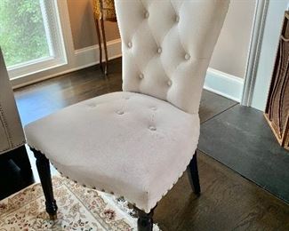 Upholstered tufted dining chairs.  Eight available.  40.5"H x 21"D x 23"W