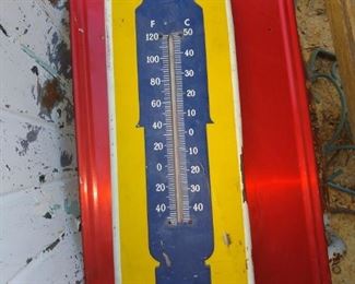 Vintage Monroe advertising thermometer.