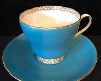 Blue and Gold Cup and Saucer $20