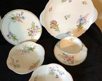 Wild Flowers #13668 - Handled Cake Plate (Blue trim), Bred and Butter Plate (Gold Trim), (2) Bowls (Pink Trim), Cup and Saucer (Gold Trim) - $50