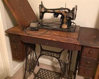 Singer sewing machine and cabinet 