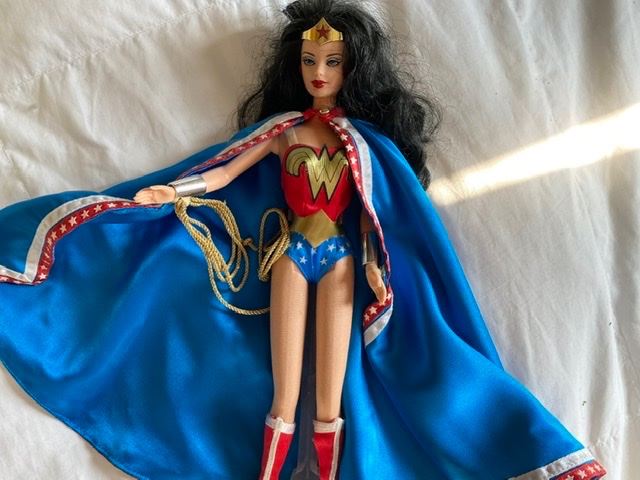 Huge collection of vintage to newer Wonder Woman collectibles.
