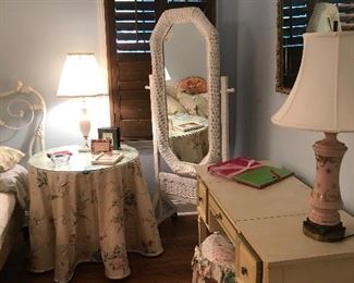 Standing wicker mirror
Round wood table with custom skirt and glass top
Vintage Provincial vanity/desk with mirror