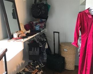 Ladies clothing , many pairs of shoes