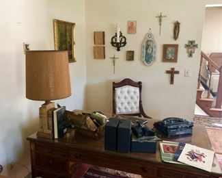 Partner's desk and religious wall art
