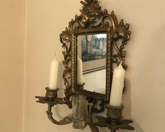 Cast metal mirrored wall sconces, one of a pair