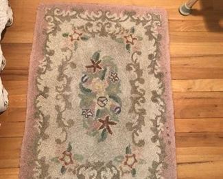 Hooked floral rug