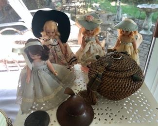 Story book dolls, Victorian Sewing basket, and antique wood hat inkwell. 