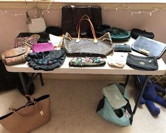Many purses and pocketbooks. 