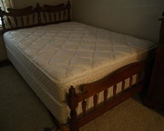 Bed with replacement side frames allowing to use full sized or queen sized mattresses. 