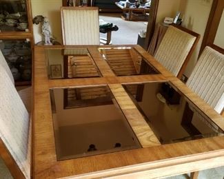 Wonderful glass mid century dining room table with 7 padded chairs