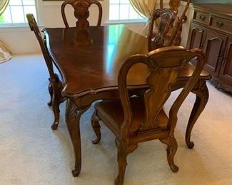 Bernhardt Dining Table w/6 Leather Seated Chairs and 2 additional Leaves and Pads $1,800.00