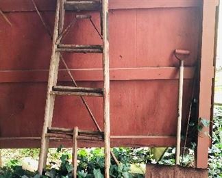 Old tools and wooden ladder