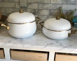 White and brass cookware