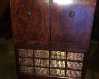 Lot 15B Vintage General Electric Console TV, This TV is located up a very steep set of stairs and needs to be moved out by purchaser. $200