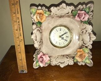 Capodimonte Clock, lower right flower is chipped. $15.00