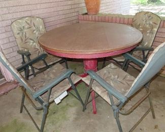 Primitive Round Table - 4 Folding Chairs