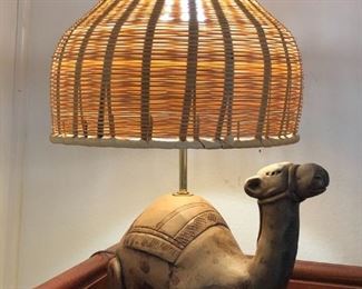 Camel figural table lamp with wicker shade