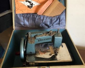 Little brother sewing machine in case 
Collectible 