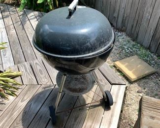Charcoal grill - IT'S GRILLING SEASON comes with one of those little metal round things my dad used to stuff with newspaper then cover in charcoal bricks and light on fire, then sit and wait for like 2 hours to heat up so we could finally have hamburgers.  $35