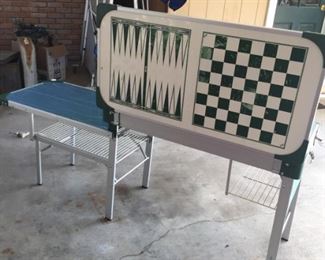 Quite possibly the most versatile piece of camping equipment you can't live without!  Unfold it and you've got a game table then bam - (click to next picture)