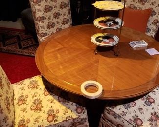 Covered Chairs with a wonderful Round Game Table. 