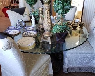 Just a fabulous and wondeful Pedestal Table with Fluttered Edge Glass and 6 wonderful Covered Fringed Chairs....I bet you've got to have it!