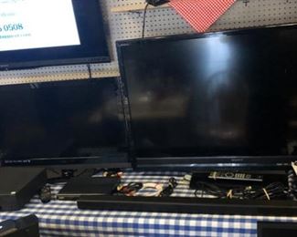 "SONY," "SAMSUNG," & "VIZIO" TV's & Monitors, "SONY" DVD player, "GE" VCR, "MGA" AM/FM Stereo Tuner, & "KENWOOD" Speaker, plus other stereo equipment and speakers 