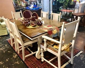 Antique Solid Wooden Table, re-furbished with a stained top and painted legs & newly reupholstered and painted matching chairs (6). The base of this table is gorgeous!!!