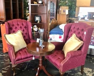 Antique Mahogany Small Round Duncan Phyfe Table, Pair of Burgandy, Brass Studded, Wing Back Chairs, and a small 4-tier wooden corner cabinet