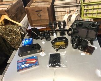 Cameras, Polaroids, Ski Goggles, Sling Shot