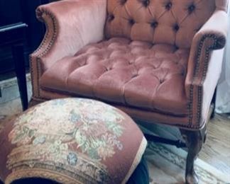 Tufted wing back chair and ottoman.