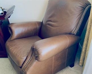 Brown leather recliner.