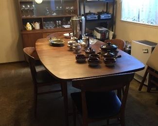 Mid - Century dining table and China cabinet.