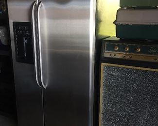 GE side by side refrigerator with ice and water.