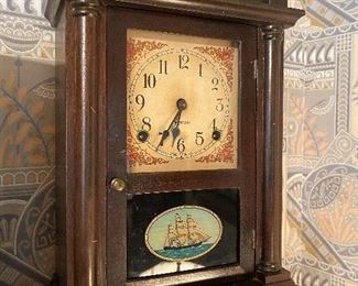 Shelf clock with ship scene